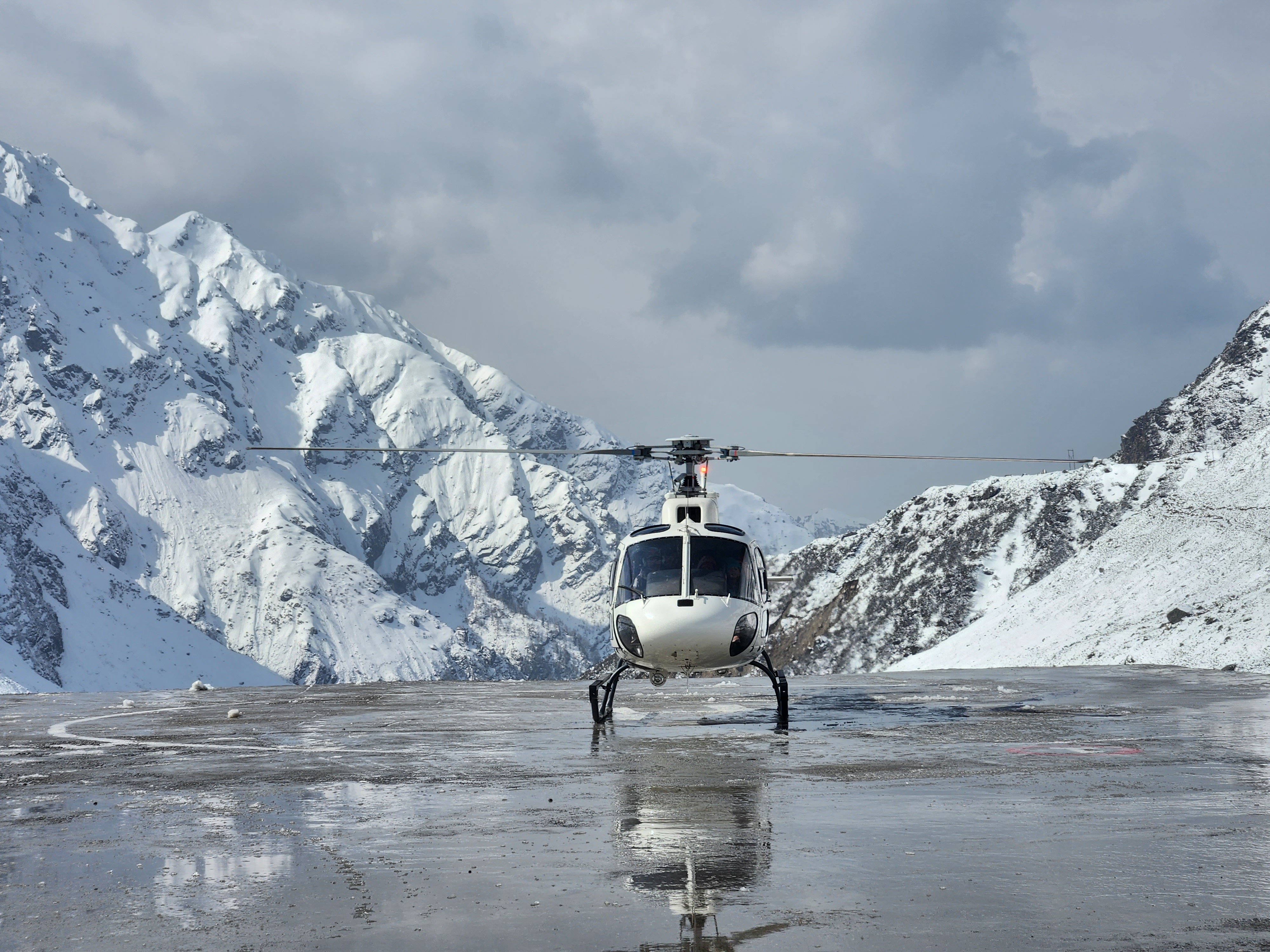 Helicopter over mountains